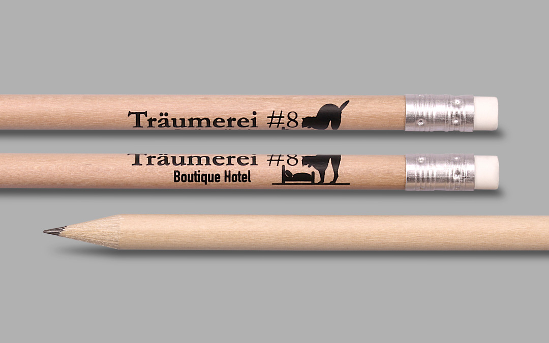 black imprint on round natural pencil