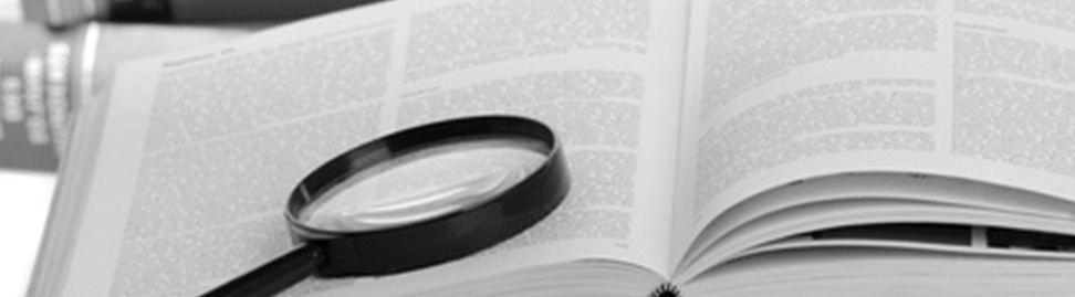 magnifying glass on book