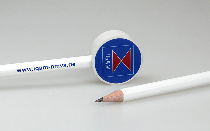round eraser on white lacquered pencil