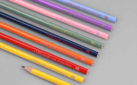 different lacquered triangular pencils with digital printing